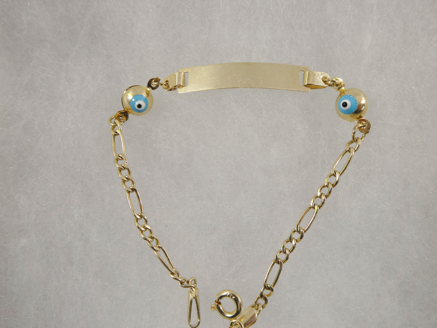 14K real solid yellow gold 5.5 inch Figaro style evil eye baby ID bracelet