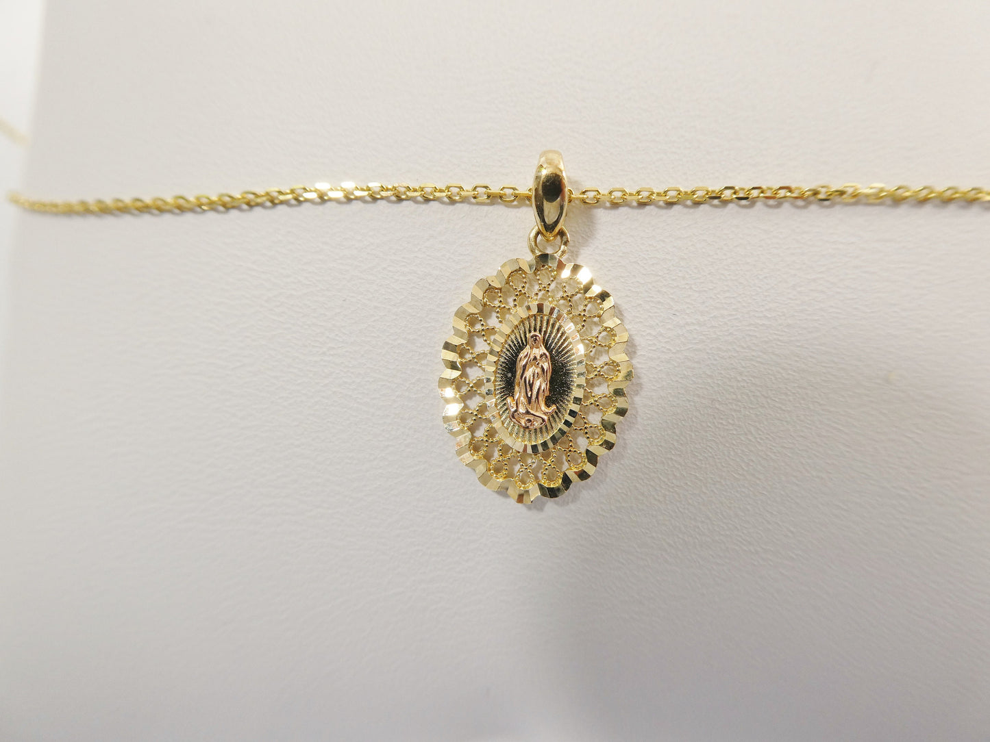 10k real solid yellow gold Guadalupe pendent and 18 inch cable necklace