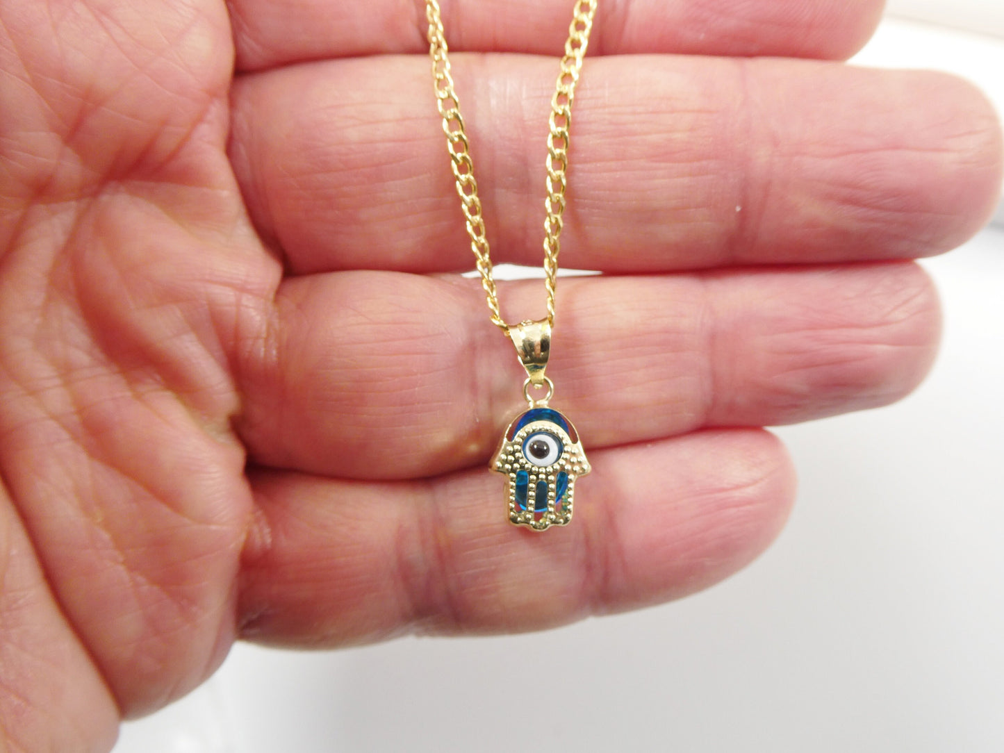 real 14k solid yellow gold 16 inch curb chain and evil eye pendent charm