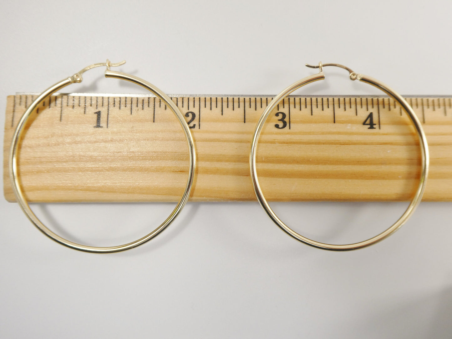 real 10k solid yellow gold plain high polish 50mm hoop earrings