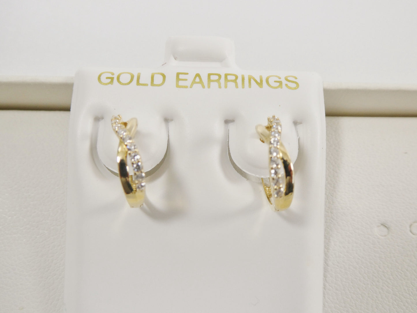 real 10k solid yellow gold xo style huggie hoop earrings