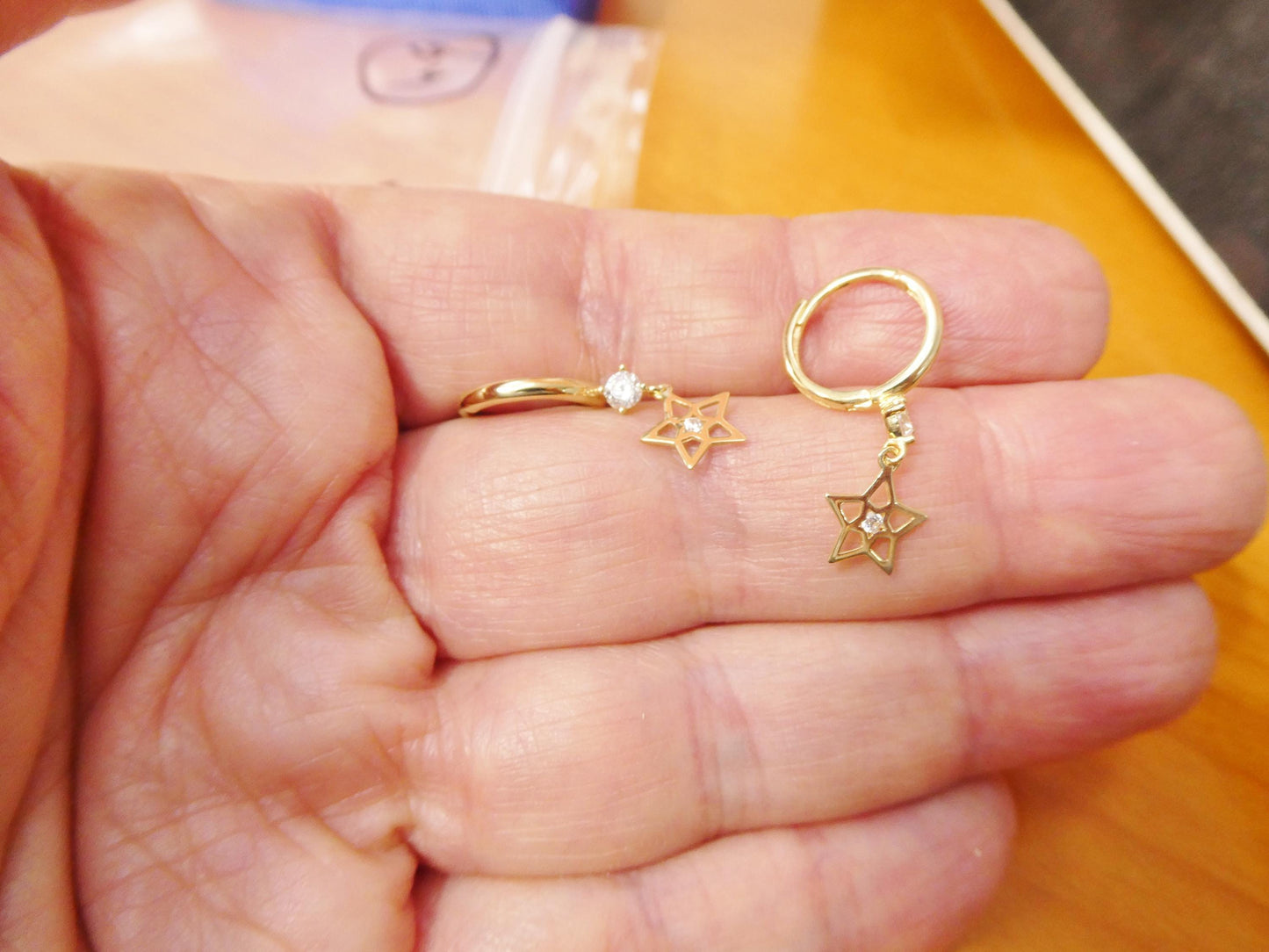 real 10k solid yellow gold designer star hoop huggie earrings