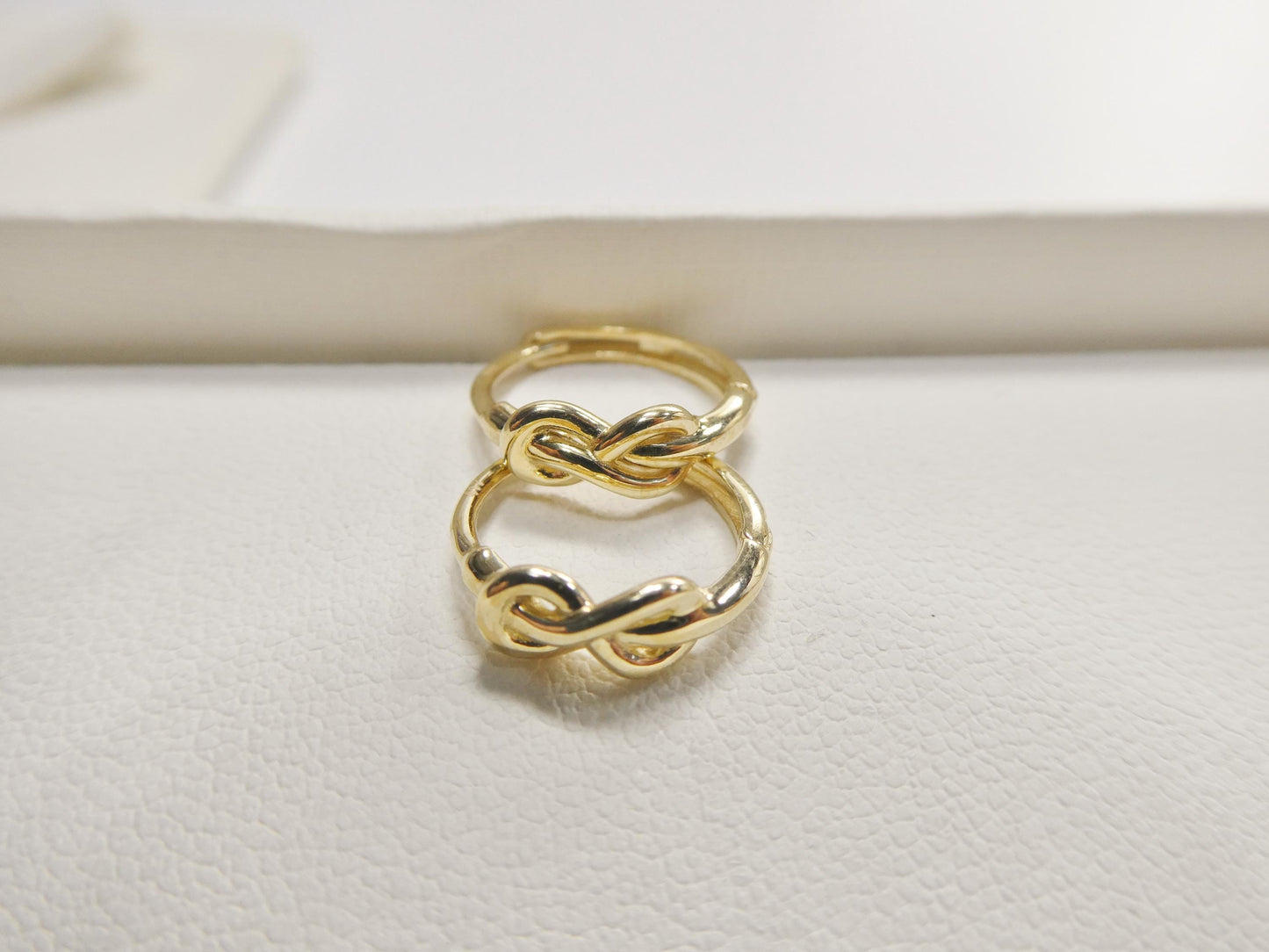 real 10k solid yellow gold designer knot hoop huggie earrings