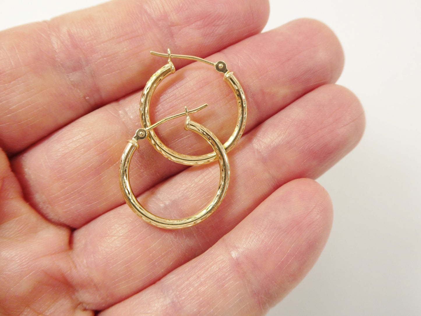 10k real solid yellow gold 2mm tube diamond cut hoop earrings