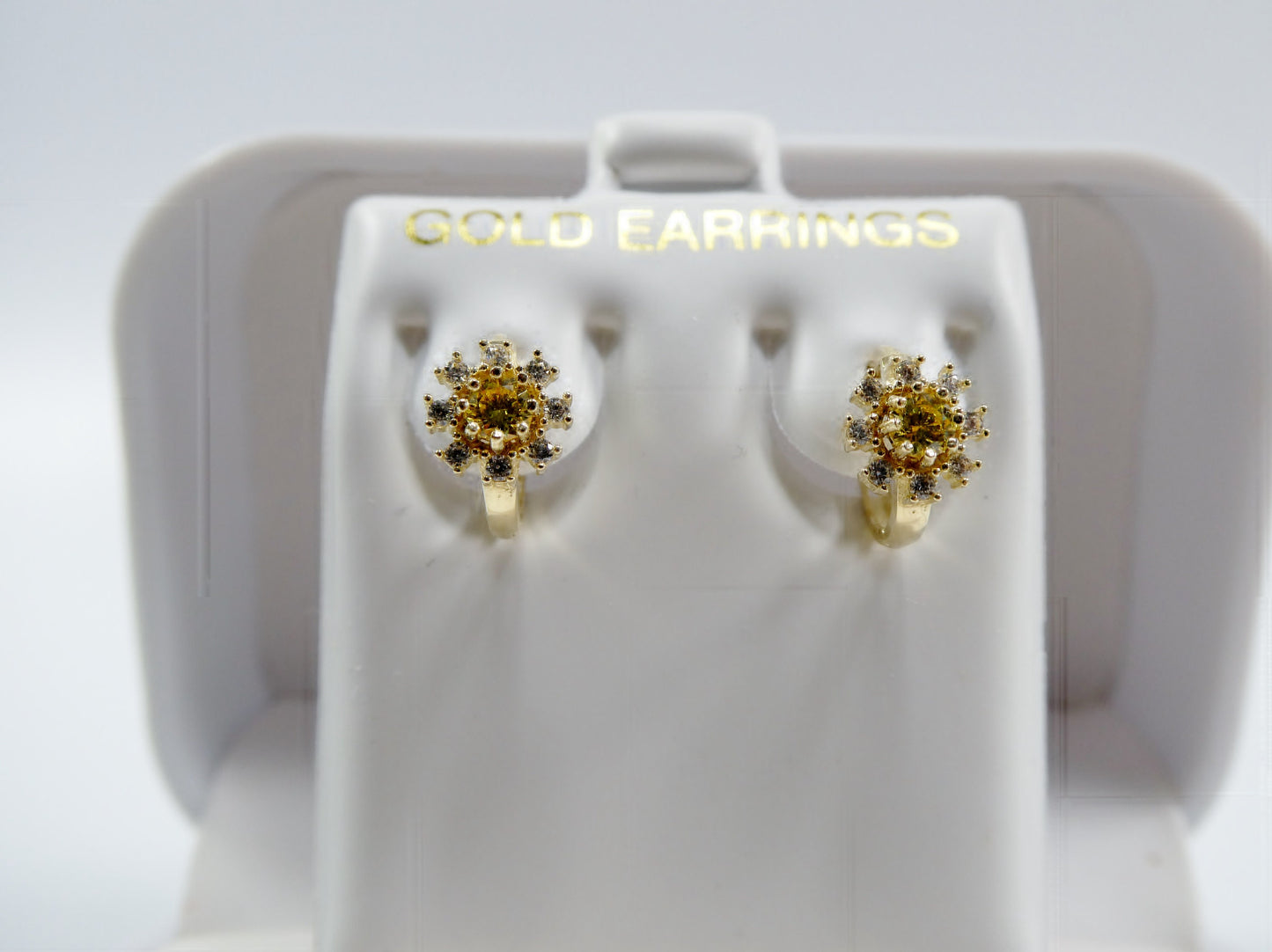 real 10k solid yellow gold birthstone color flower huggie earring