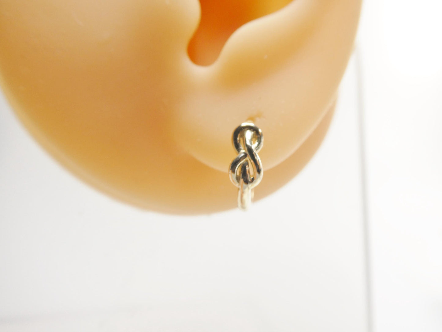 real 10k solid yellow gold designer knot hoop huggie earrings