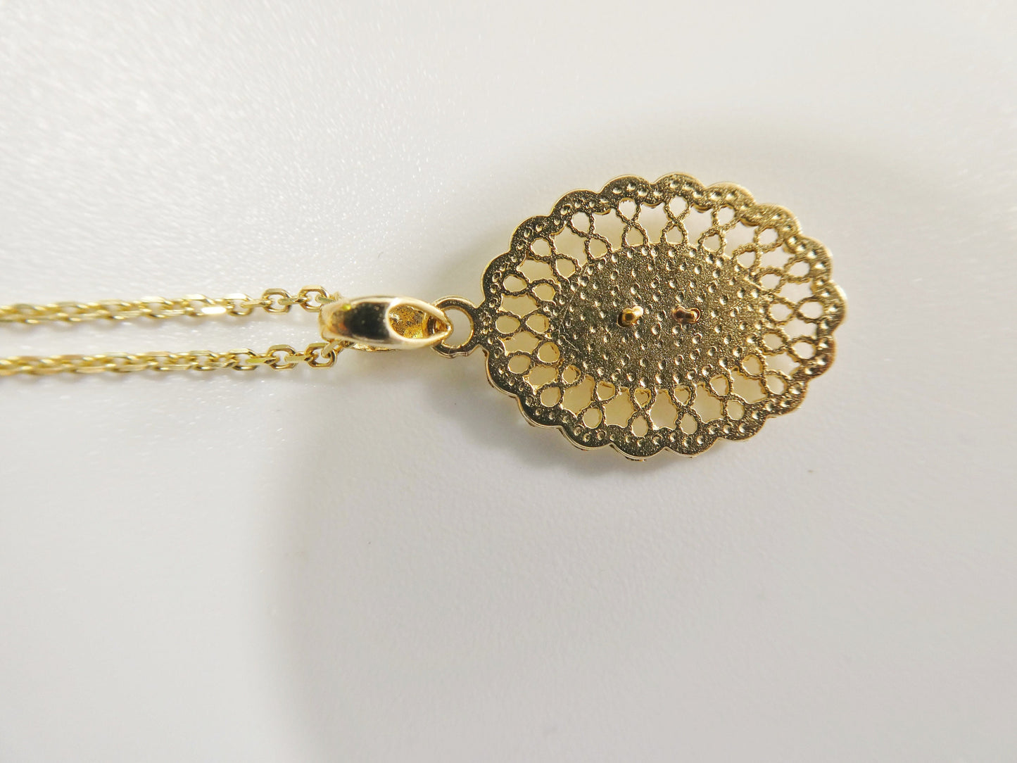 10k real solid yellow gold Guadalupe pendent and 18 inch cable necklace