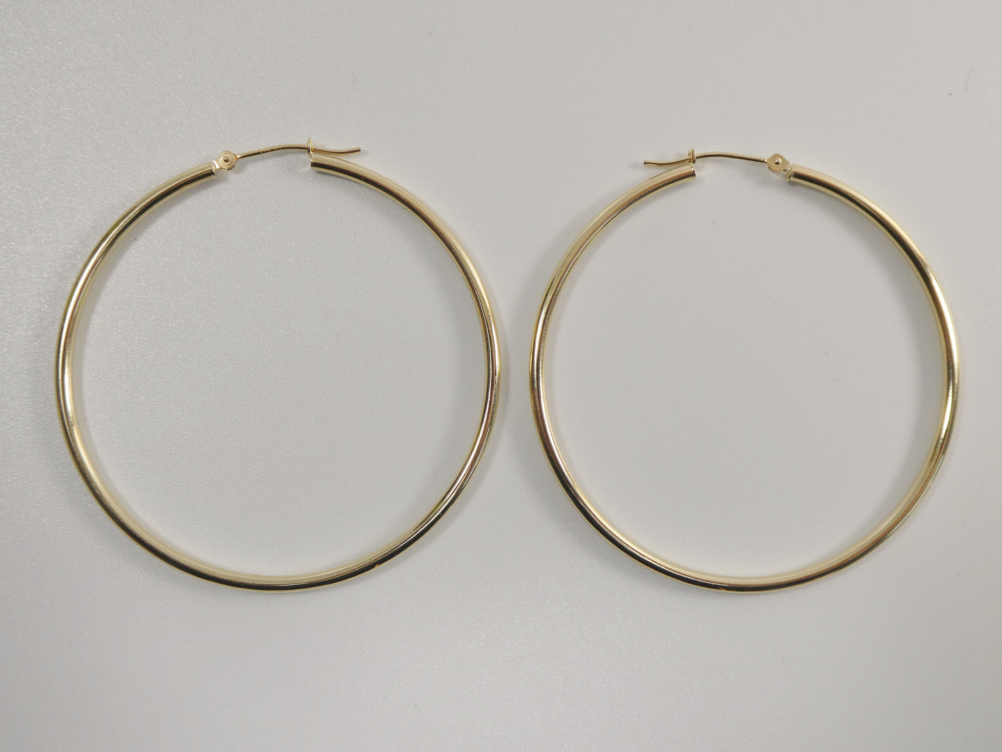14K real solid yellow gold 2mm / 50mm round hoop earring snap closure high polish finish