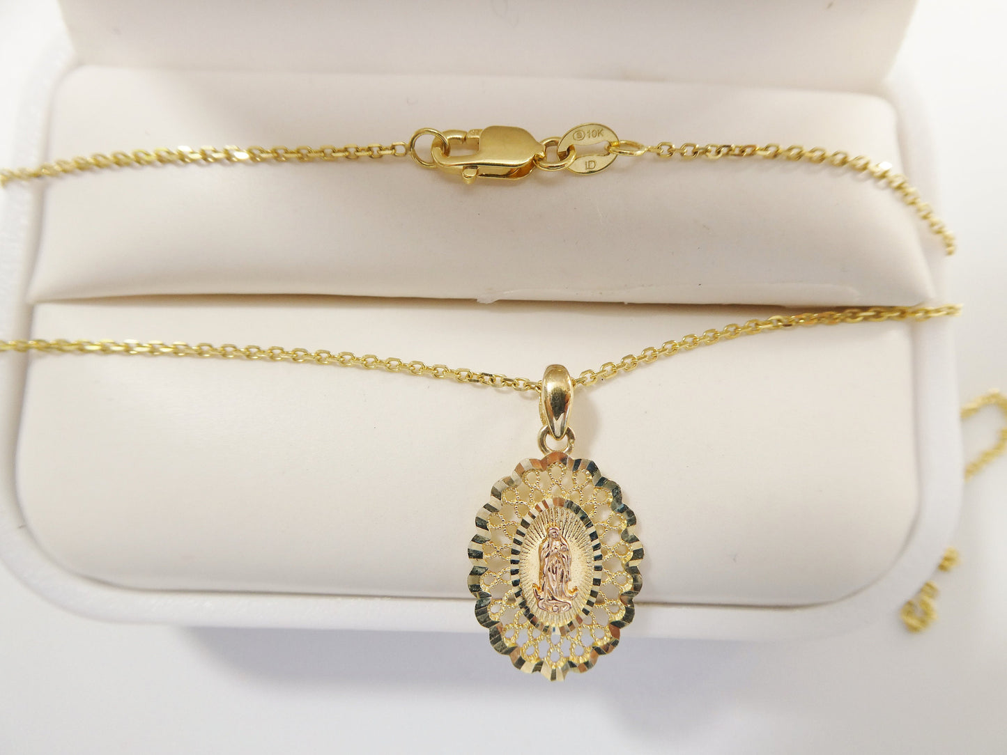 10k real solid yellow gold Guadalupe pendent and 18 inch cable necklace