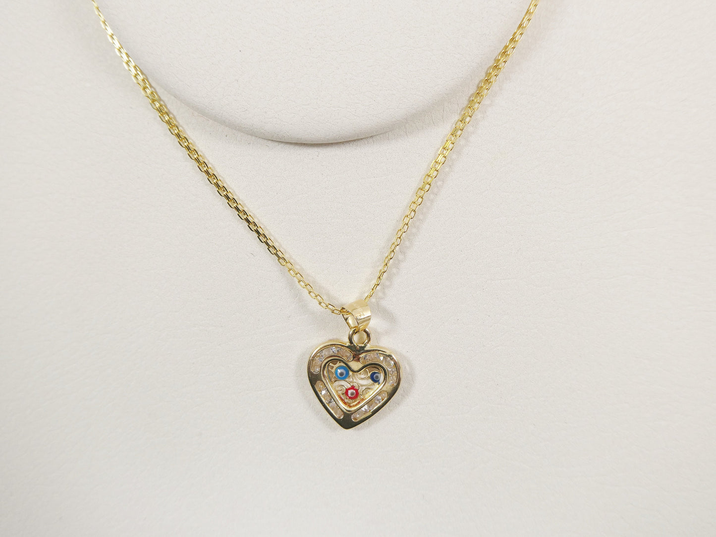 real 14k solid yellow gold 16 inch Bismarck chain and evil eye heart pendent