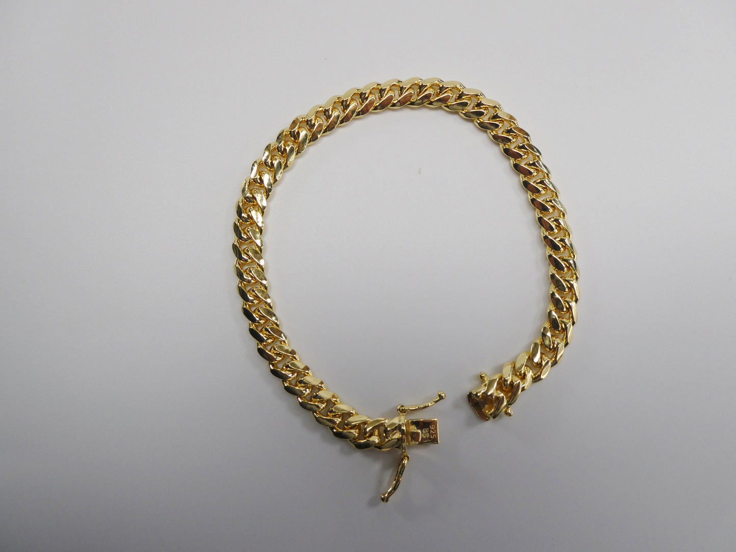 14k gold color tone solid box clasp lock Miami bracelet over real 925 sterling silver
