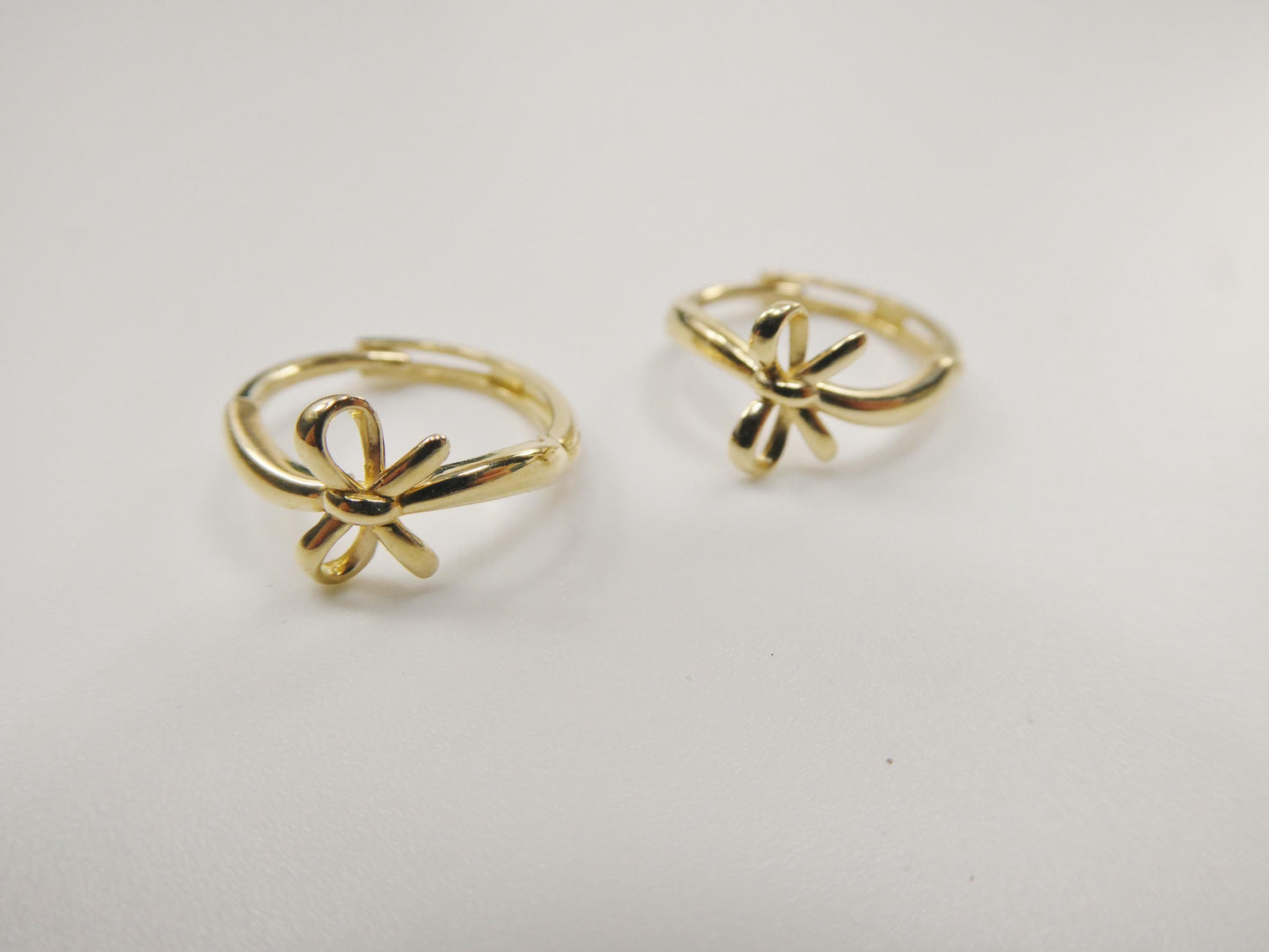 real 10k solid yellow gold designer bow hoop huggie earrings
