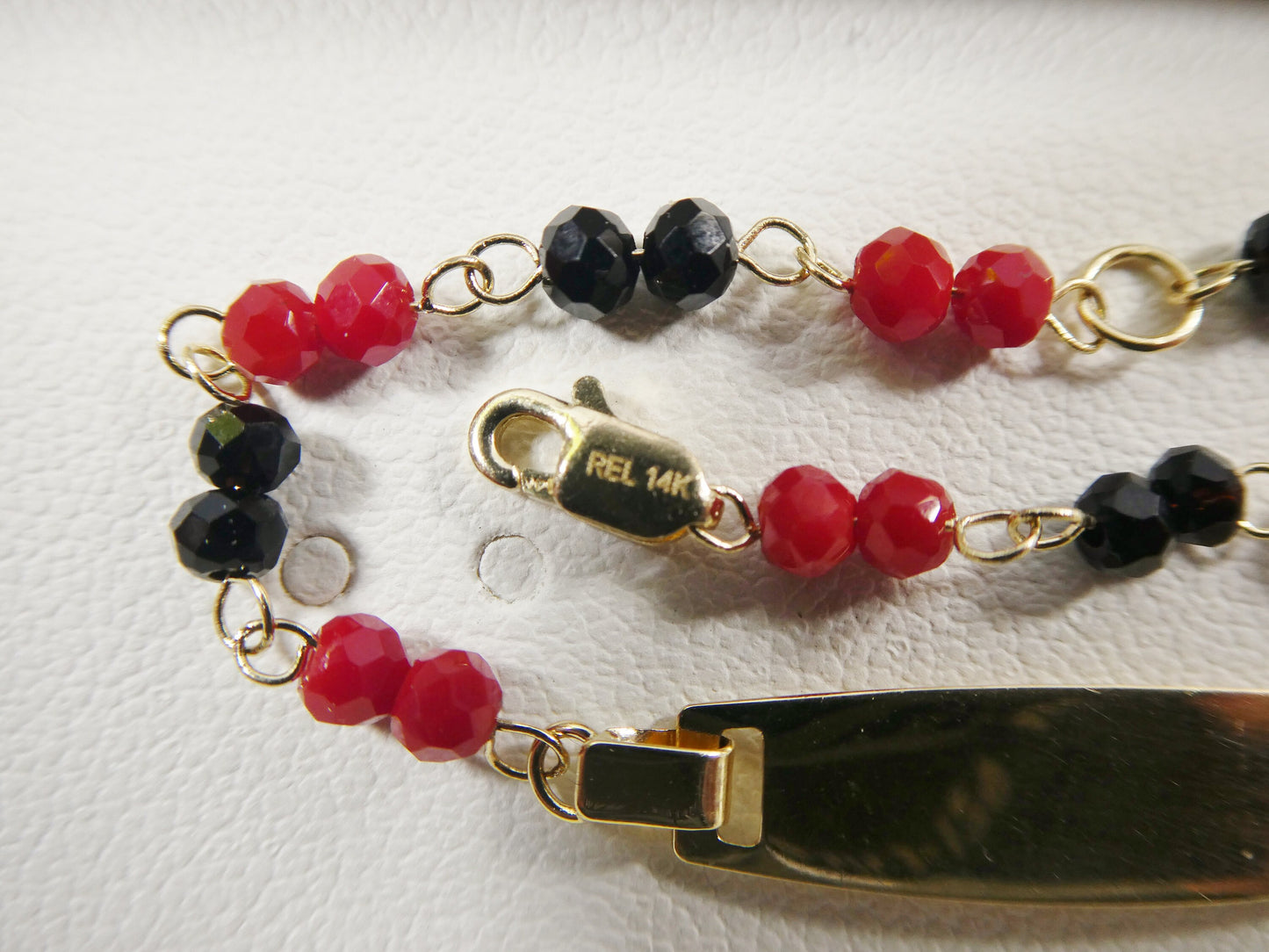 real 14k yellow gold / red / black / stone 5.5 inch baby ID bracelet