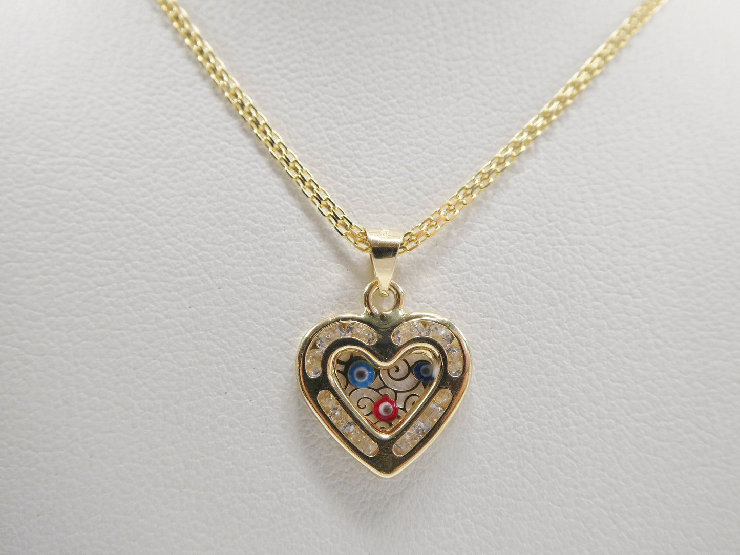 real 14k solid yellow gold 16 inch Bismarck chain and evil eye heart pendent
