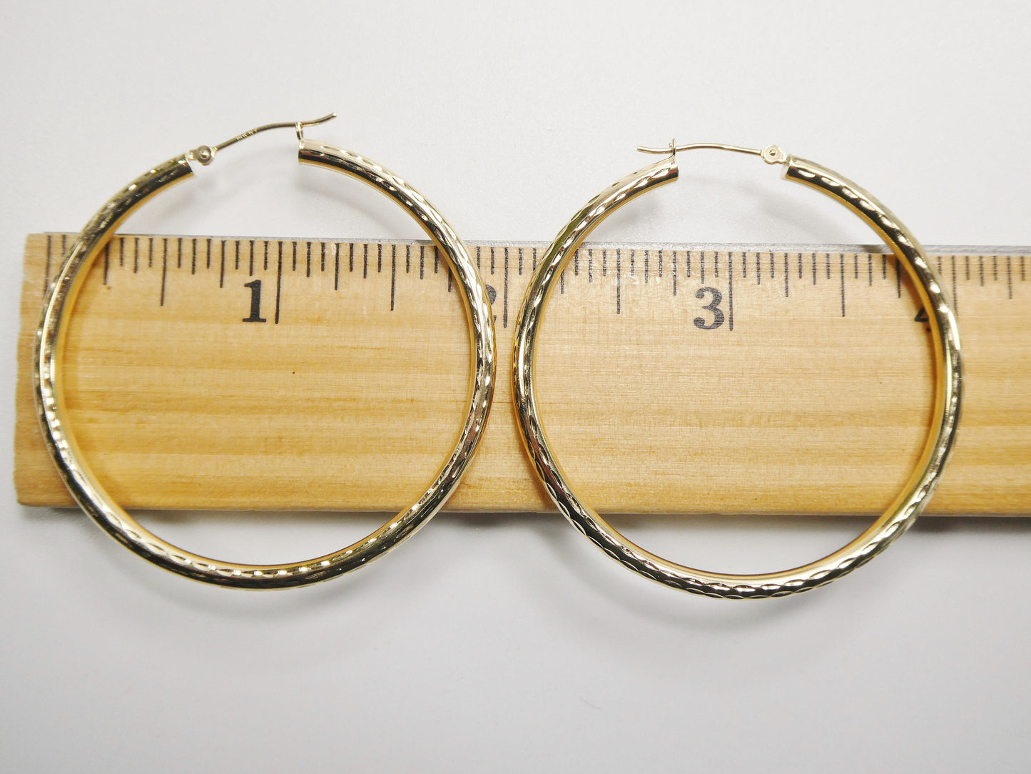 14K real solid yellow gold 50mm round hoop earring snap closure full diamond cut finish