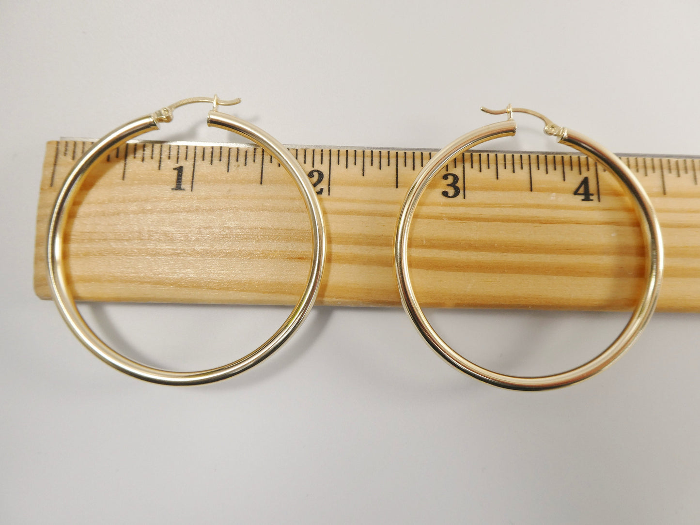 real 10k solid yellow gold plain high polish 50mm hoop huggie earrings