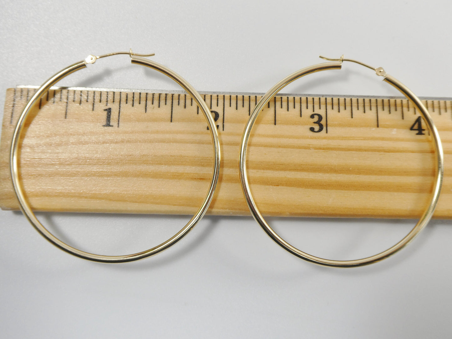 14K real solid yellow gold 2mm / 50mm round hoop earring snap closure high polish finish