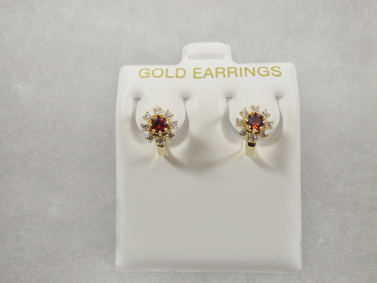 real 10k solid yellow gold birthstone color flower huggie earring