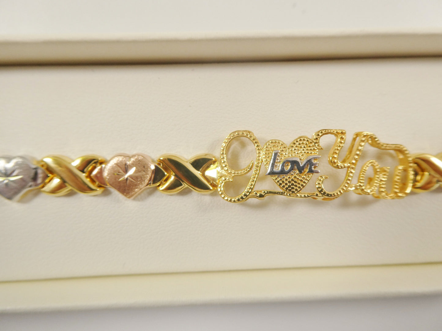 Sterling Silver 'I Love You' Bracelet: Tri-Color Heart XOXO Design