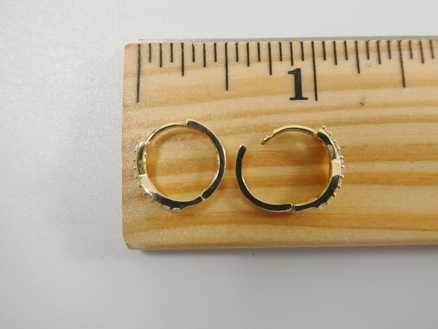 real 10k solid yellow gold xo style huggie hoop earrings