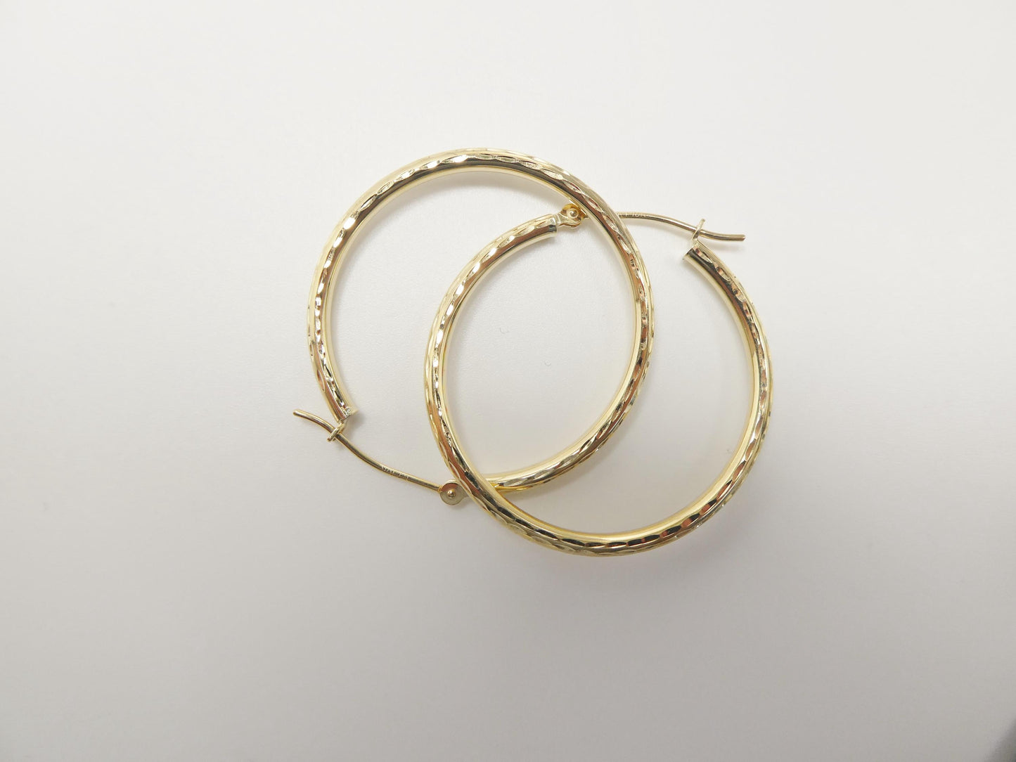 10k real solid yellow gold 2mm tube diamond cut hoop earrings