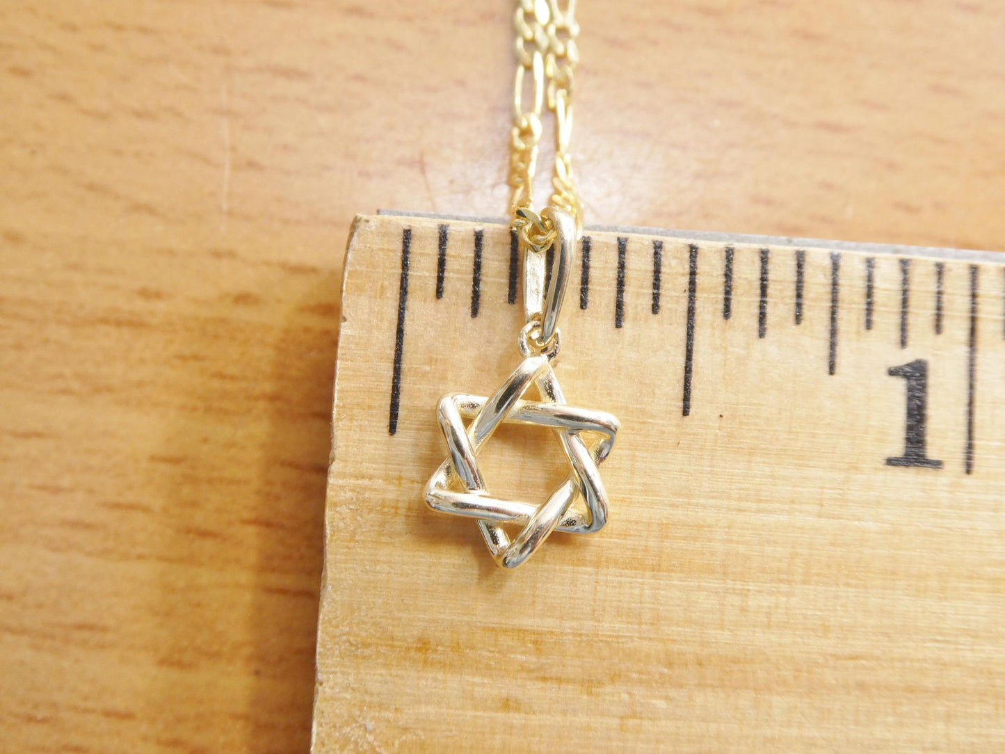 10k real solid yellow gold 18 inch solid figaro chain and star David pendent