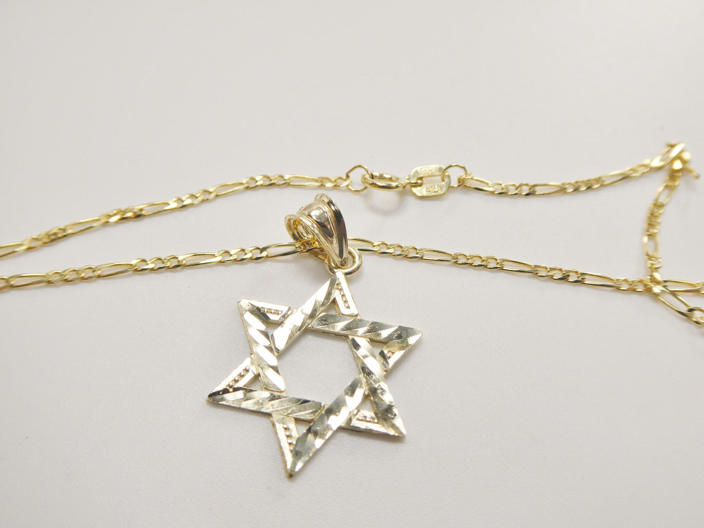 10k Yellow Gold Star of David Pendant Necklace: 18 inch Figaro Chain