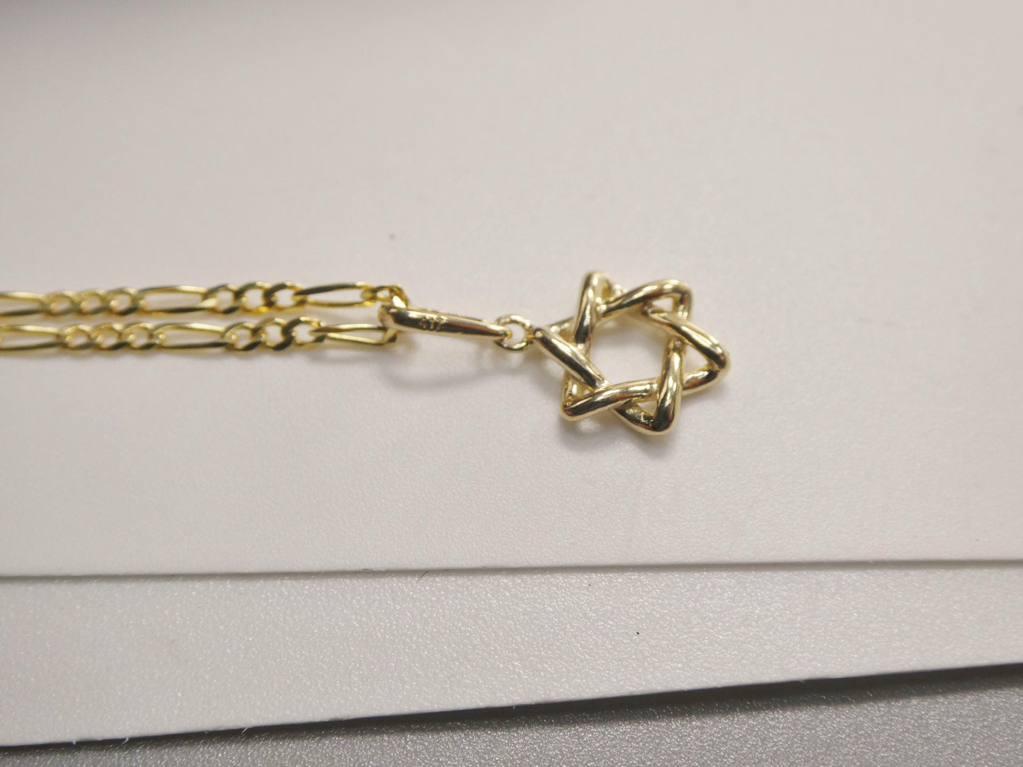 10k real solid yellow gold 18 inch solid figaro chain and star David pendent