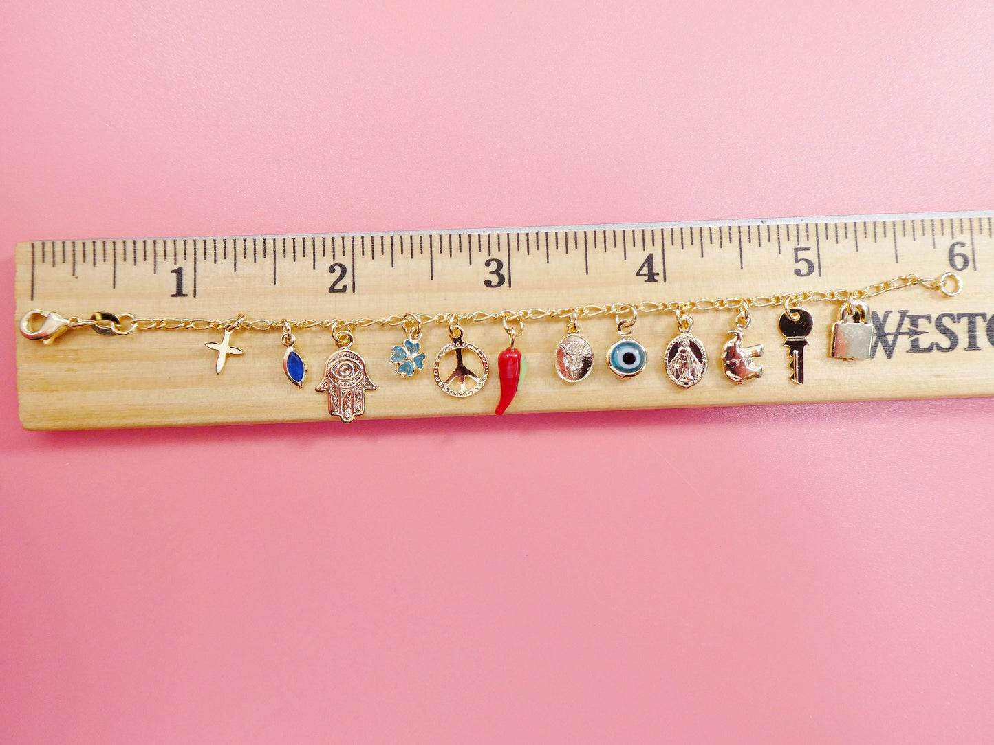6 inch 18k gold filled multi full dangling charm Figaro style baby bracelet