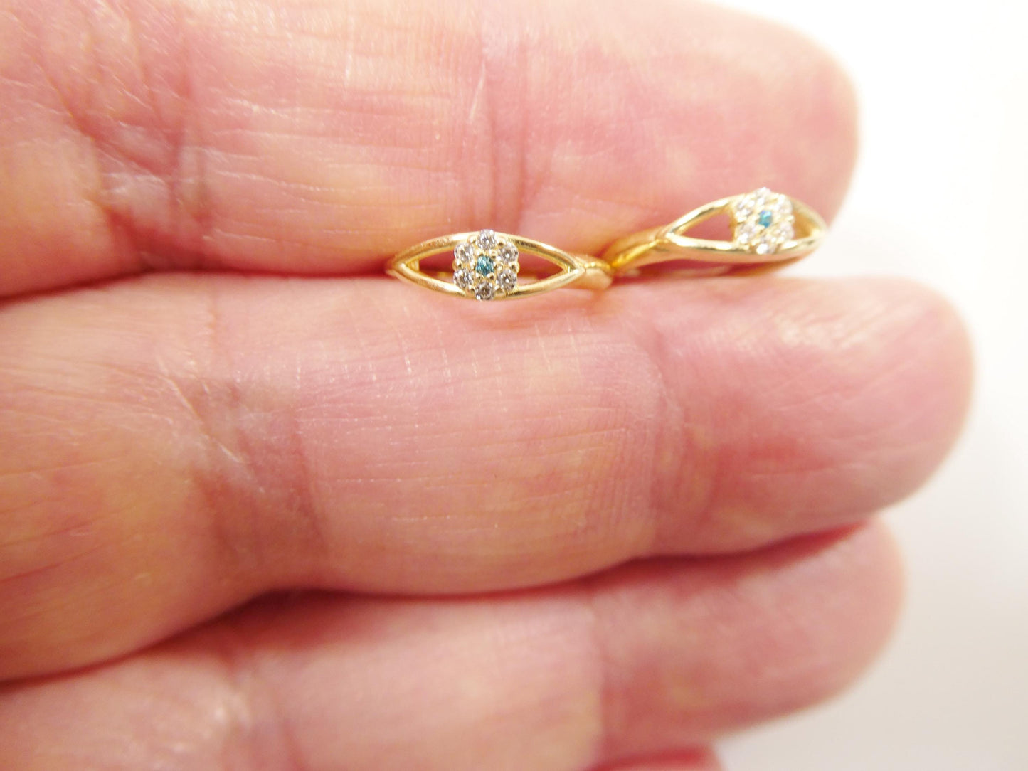 real 10k solid yellow gold evil eye hoop huggie earrings