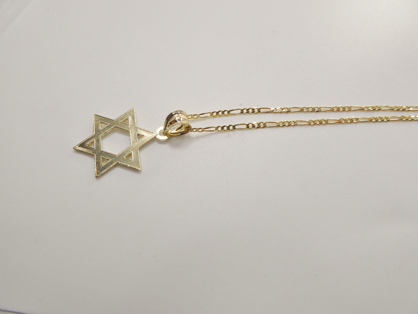 10k Yellow Gold Star of David Pendant Necklace: 18 inch Figaro Chain