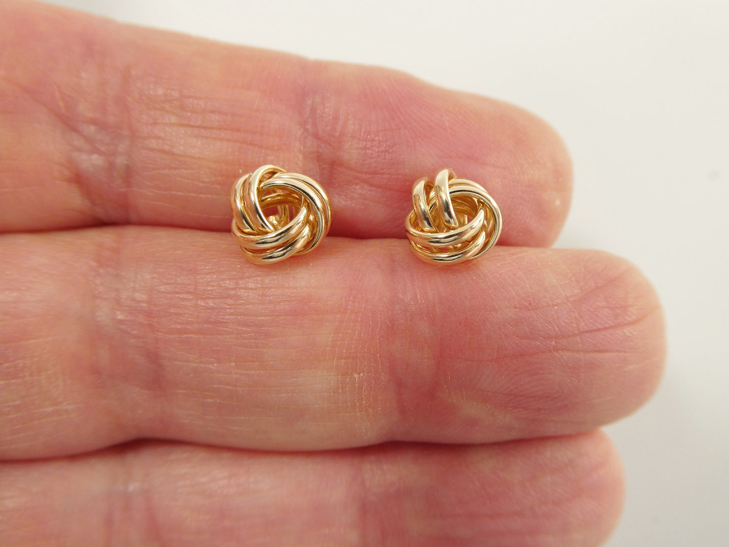 real 10k solid yellow gold push post small loveknot stud earring