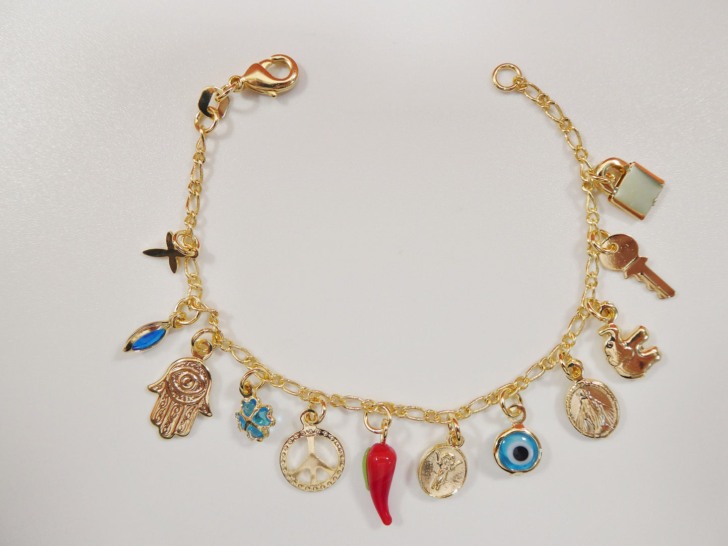 6 inch 18k gold filled multi full dangling charm Figaro style baby bracelet
