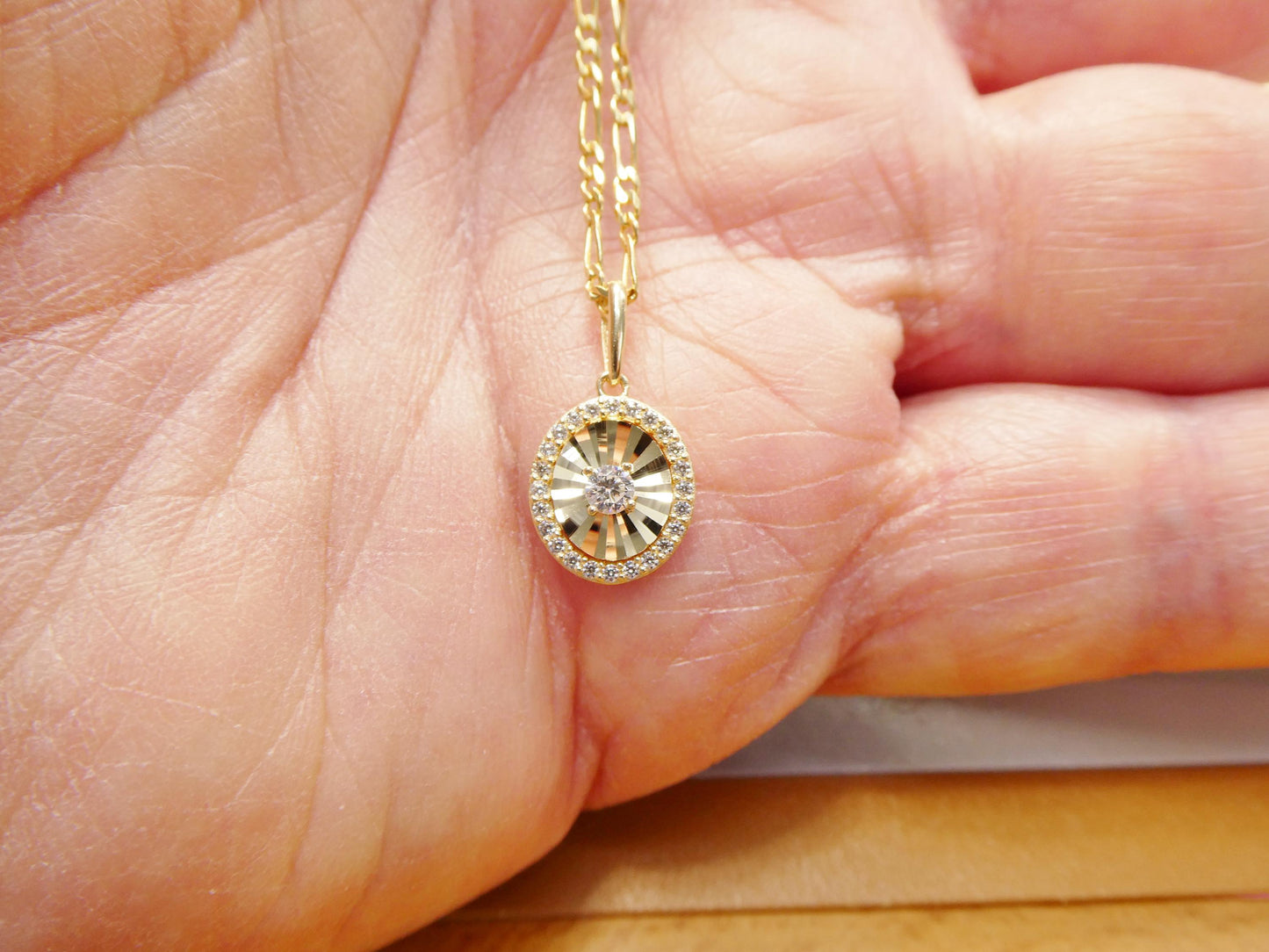 10k Yellow Gold Figaro Chain Necklace with Sun Pendant