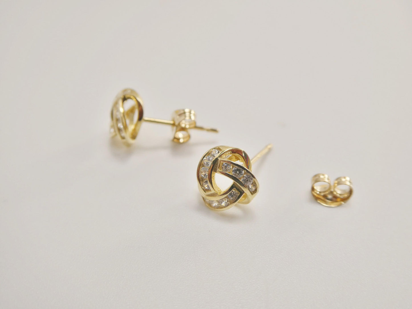 real 10k solid yellow gold push post full stone setting love knot stud earrings