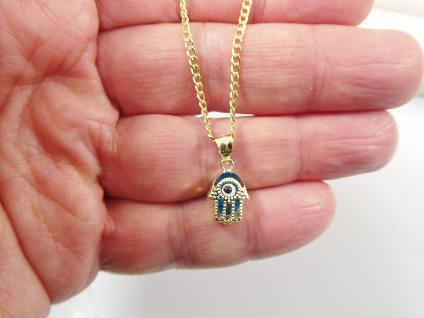 real 14k solid yellow gold 16 inch curb chain and evil eye pendent charm