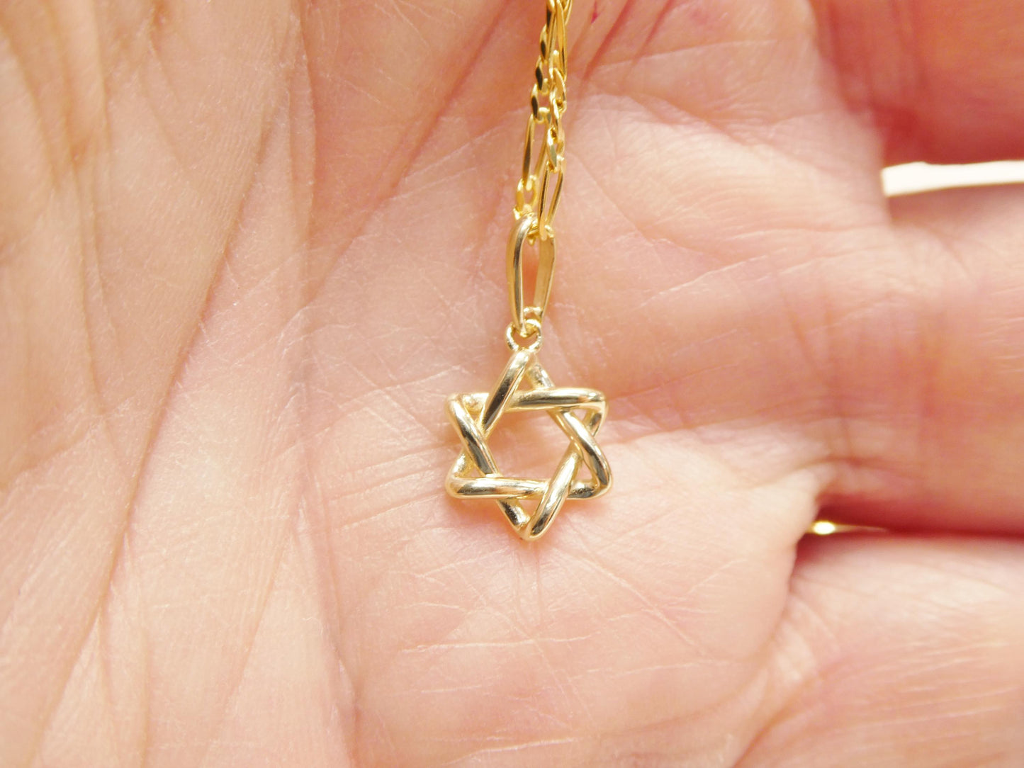 10k real solid yellow gold 18 inch solid figaro chain and star David pendent