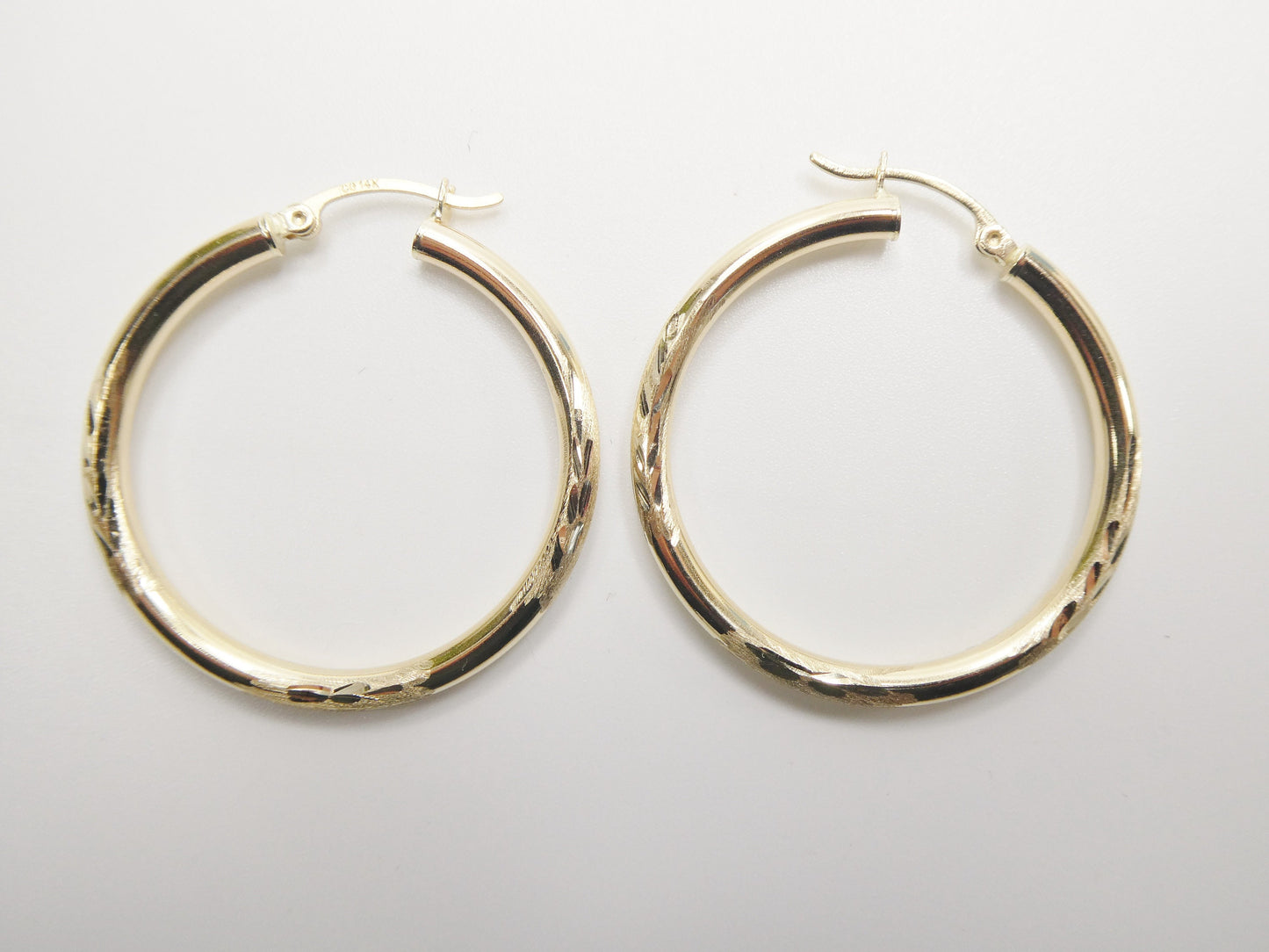 14K real solid yellow gold round hoop earrings snap closure diamond cut finish
