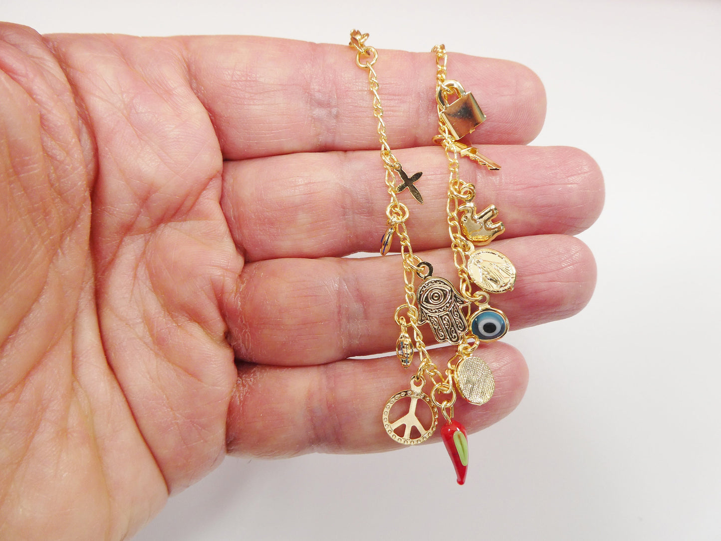 6 inch 18k gold filled multi full dangling charm Figaro style baby bracelet