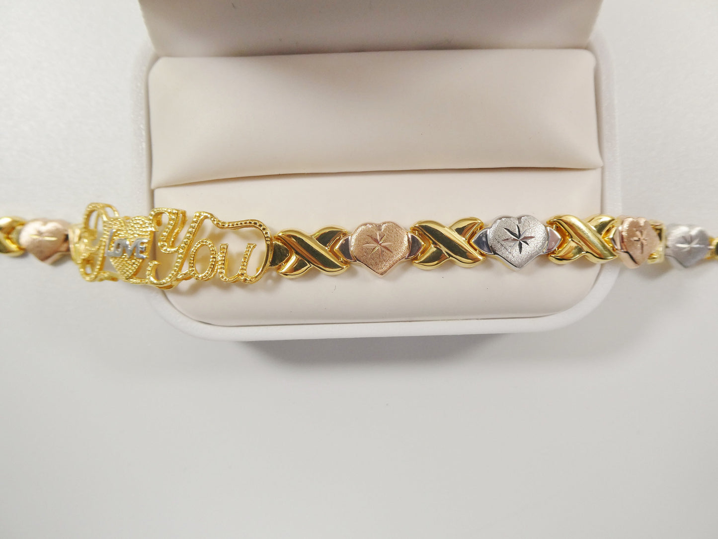 Sterling Silver 'I Love You' Bracelet: Tri-Color Heart XOXO Design
