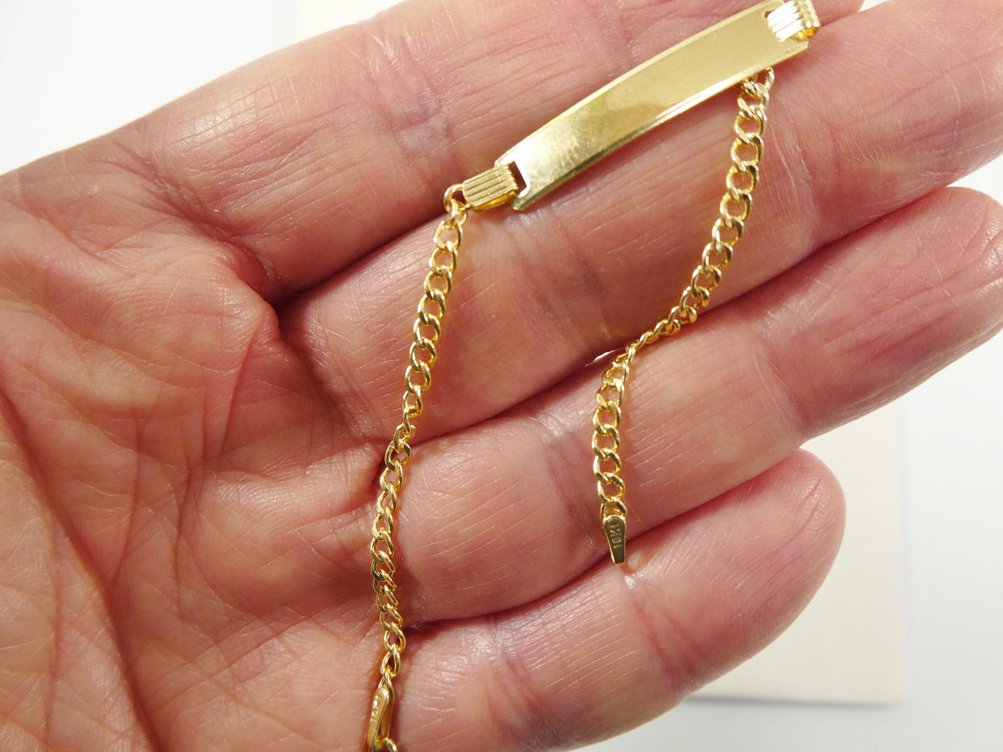 real 10k solid yellow gold 5.5 inch curb style baby bracelet