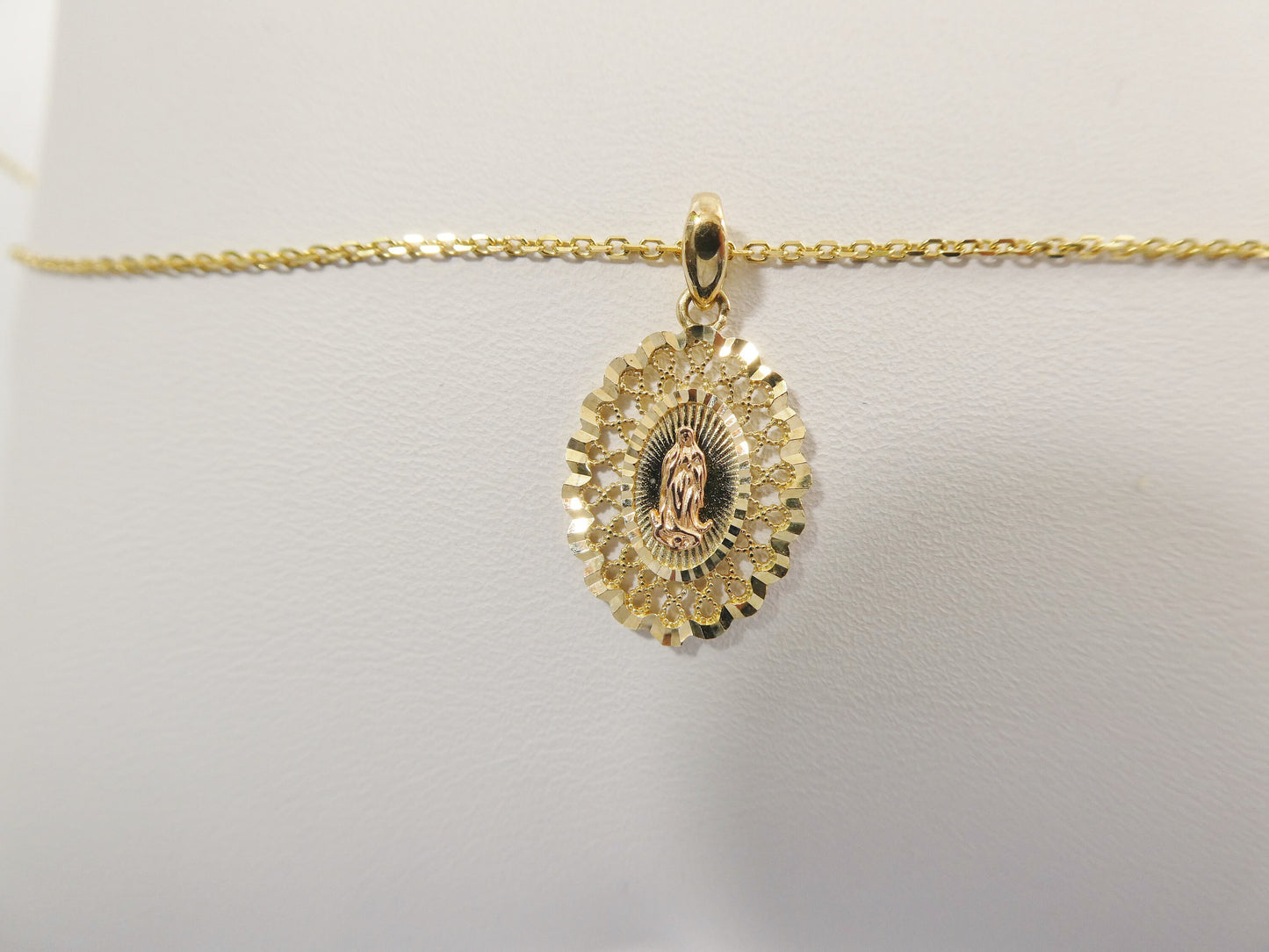 10k real solid yellow gold Guadalupe pendent and 18 inch cable necklace